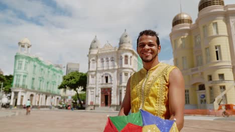 portrait of frevo dancer at the street carnival in recife, pernambuco, brazil.