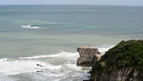 The-cliffs-that-are-home-to-a-large-bird-colony-at-Muriwai-beach-viewed-from-above