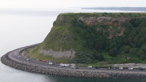 aerial of scarborough headland with trough traffic and motorhomes parked up