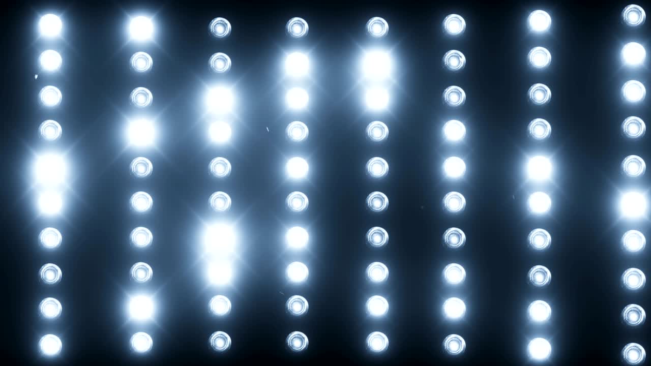 A wall of light projectors, a flash of light