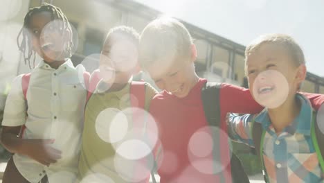 animation of bokeh lights over happy diverse schoolboys walking together outside school