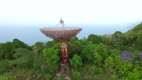 Old-abandoned-satellite-in-front-of-a-beach