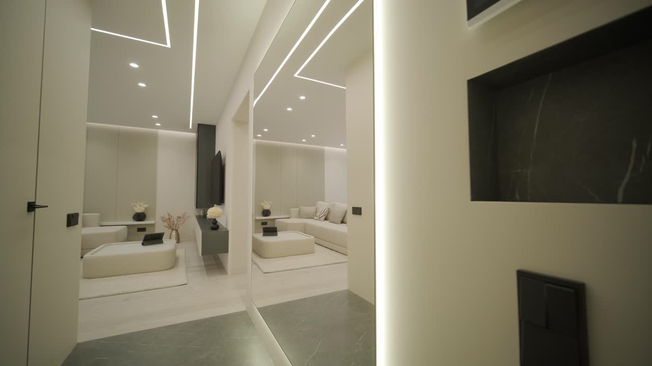 현대적인 거실 인테리어 디자인과 장식: 거실에 색 소파, 식탁과 목조 의자, 주방 카운터 및 캐비, 발코니와 함께 4k 비디오 3d 렌더링 아파트 방