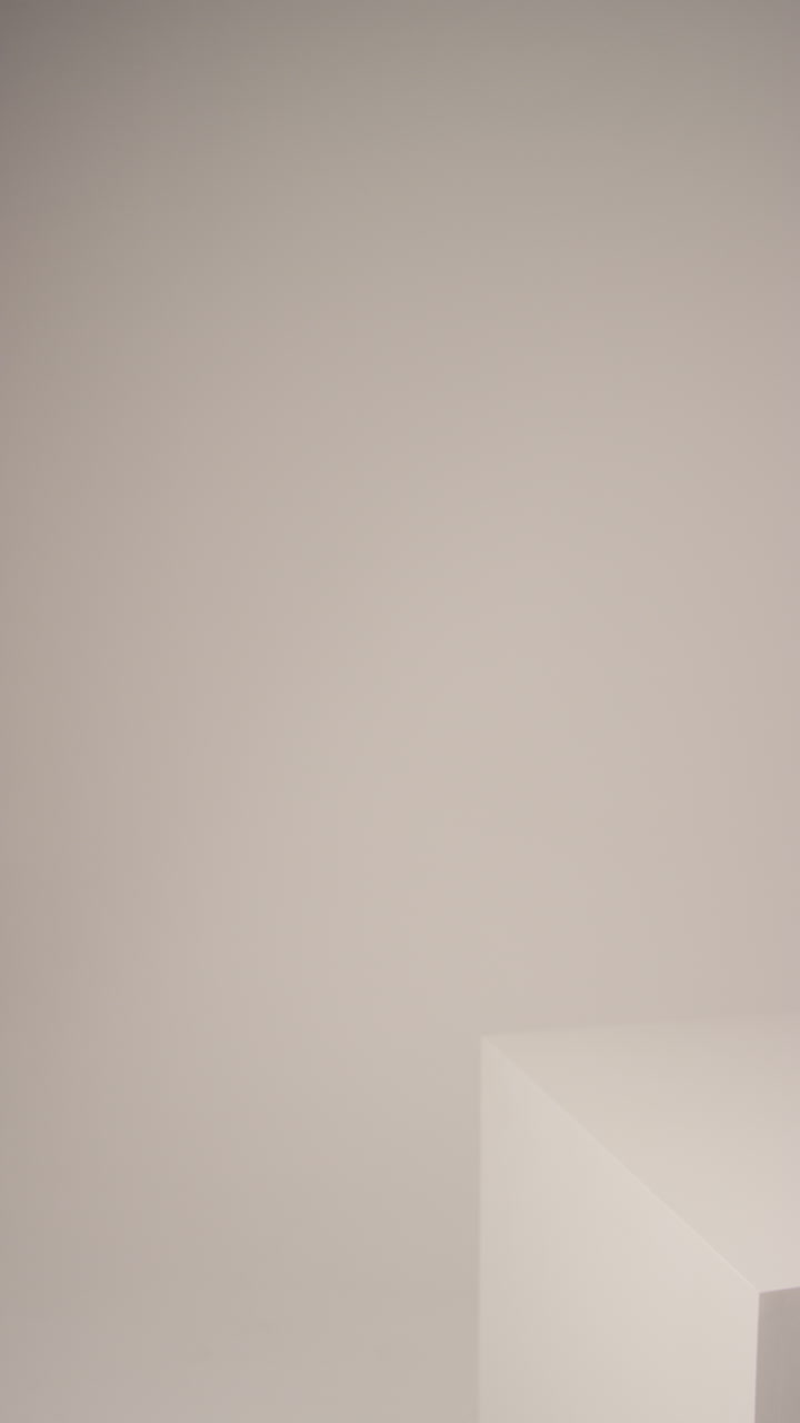 Close Up Vertical Video Of Female Social Media Influencer Producing User Generated Content Holding Out Yellow Fashion Handbag