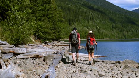 hiker couple hiking near riverside 4k