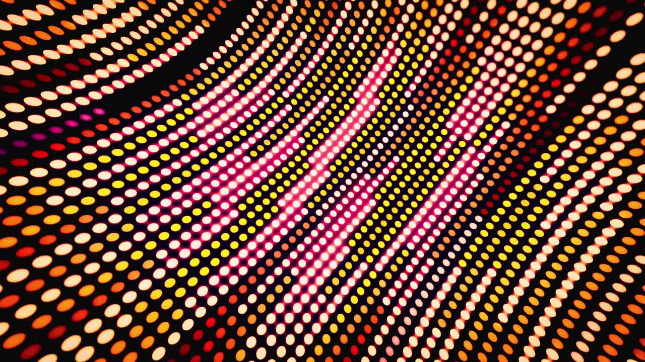Dynamic Grid of Colorful Glowing Dots Waving Abstractly