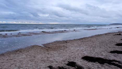 on the beach of the baltic sea is stormy weather in winter