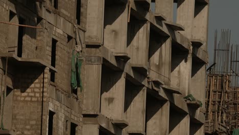 side view of construction building in bahria town karachi, low angle zoom out