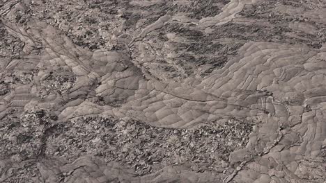 close-up aerial view of rough volcanic rock texture in iceland