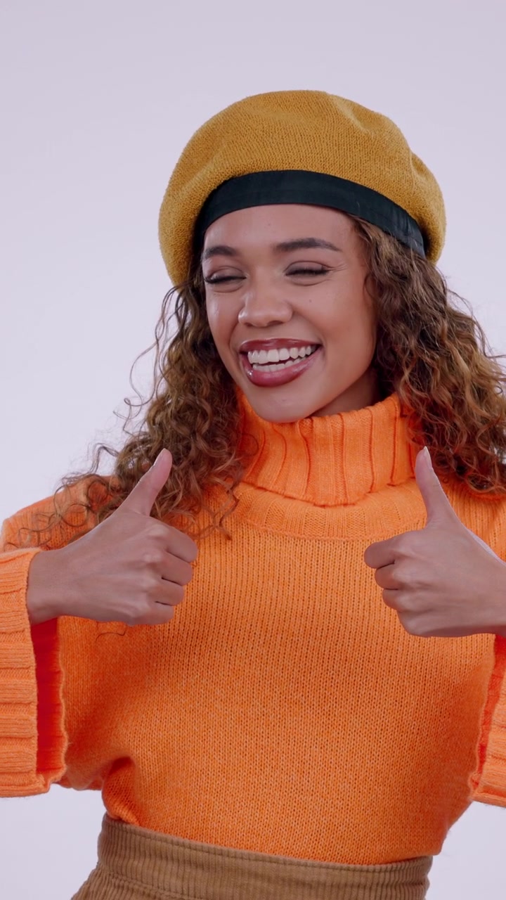 Happy Young Woman Giving Thumbs Up Gesture