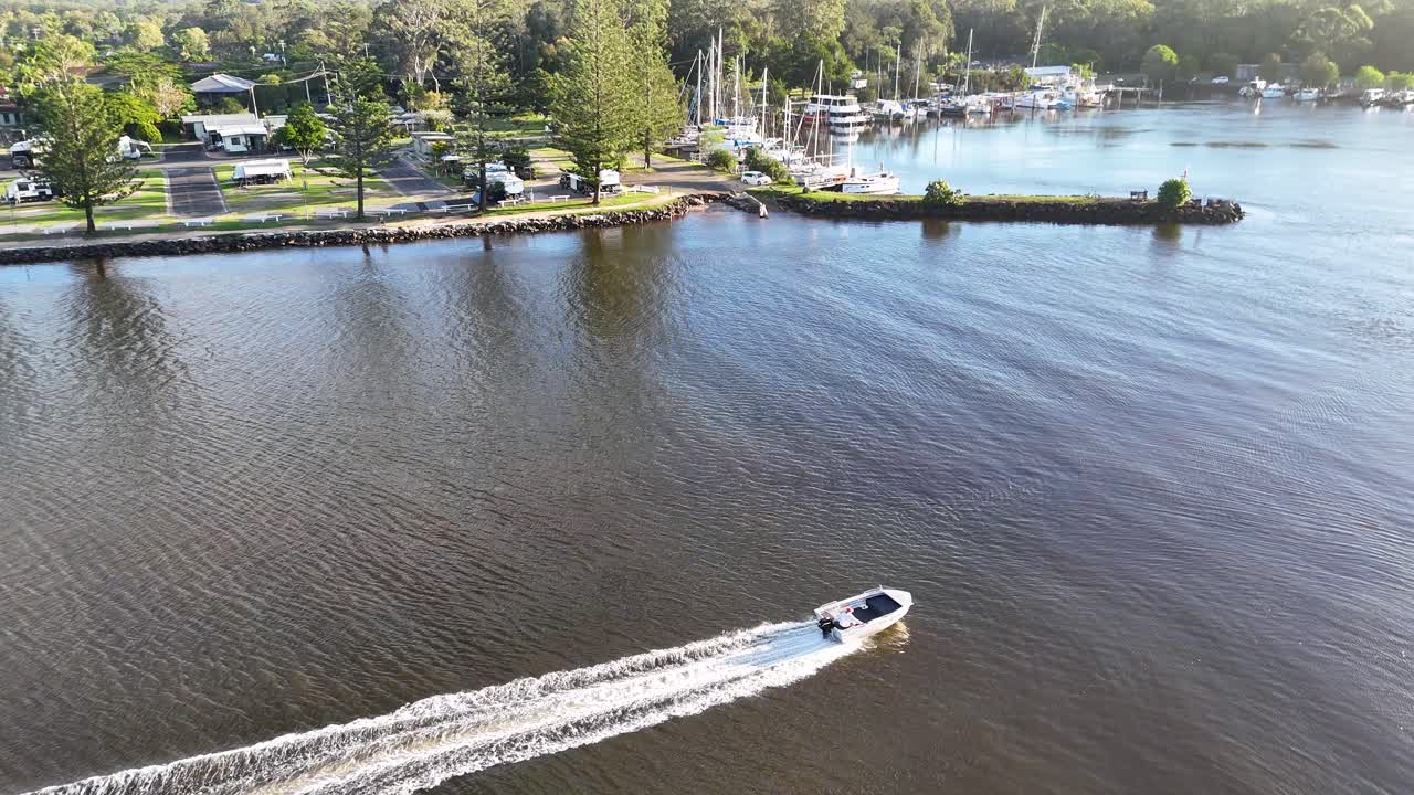 Aerial View of a River Marina with Boats