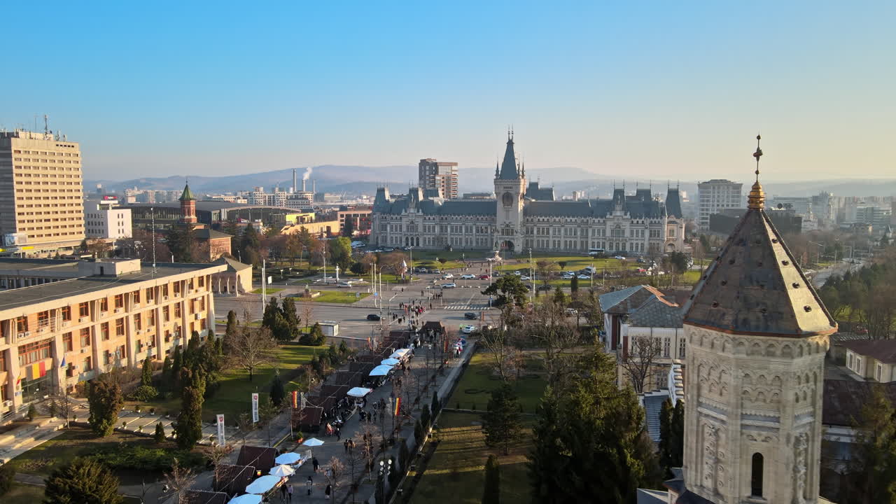 Aerial drone view of Iasi downtown, Romania. Multiple historical buildings, Palace of Culture, square in front of it