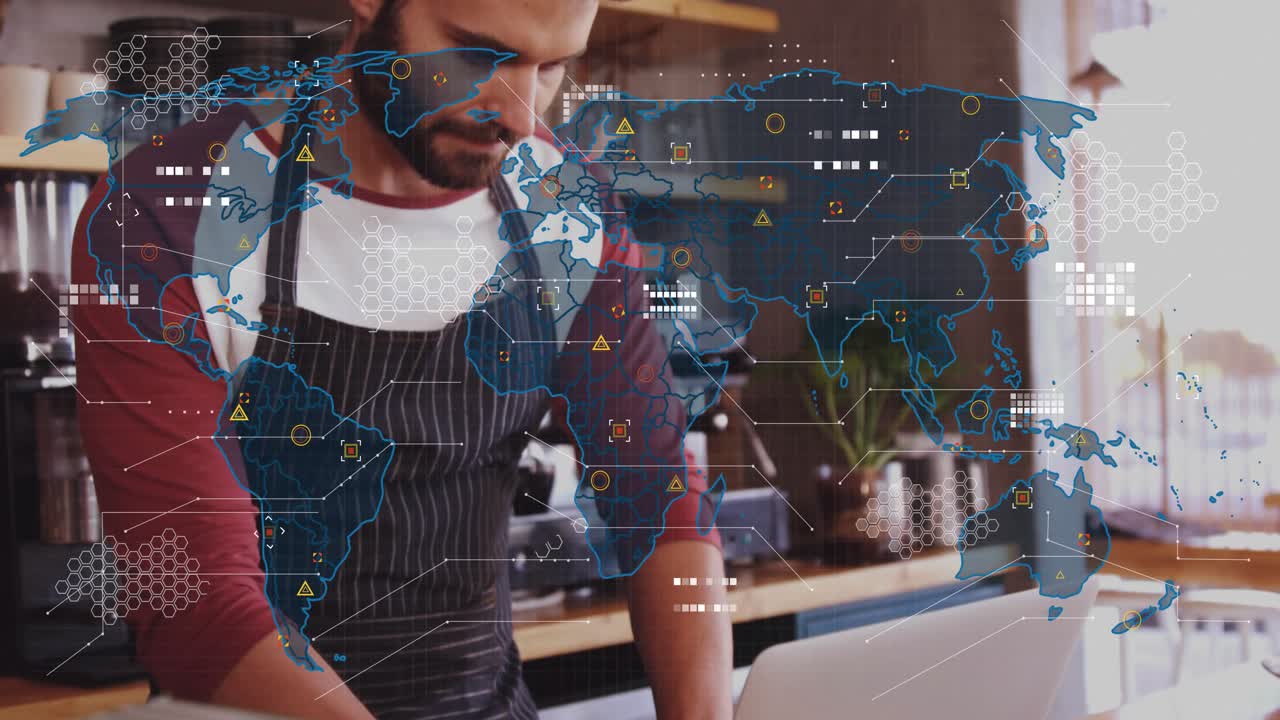 Man opening laptop behind cafe counter typing while world map overlay visualizing business orders