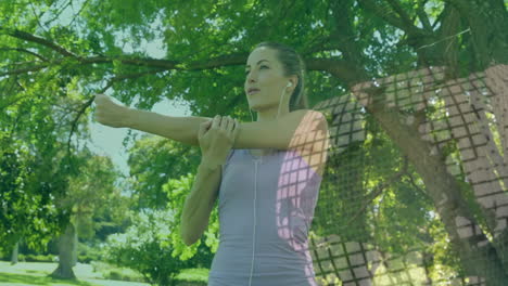 stretching in park, woman exercising with fitness data animation over scene