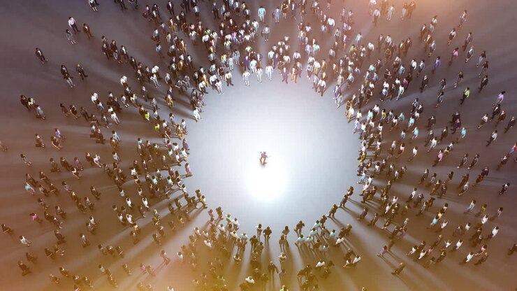 Overhead View of a Person in a Spotlight Surrounded by a Crowd