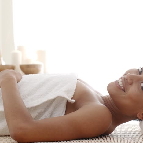 smiling female enjoying spa therapy