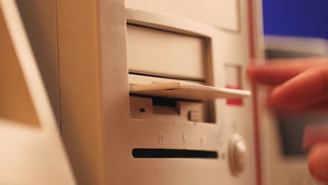 using diskette for old computer. music recorder, playing retro computer games. vintage device for office, obsolete technology. . high quality 4k footage