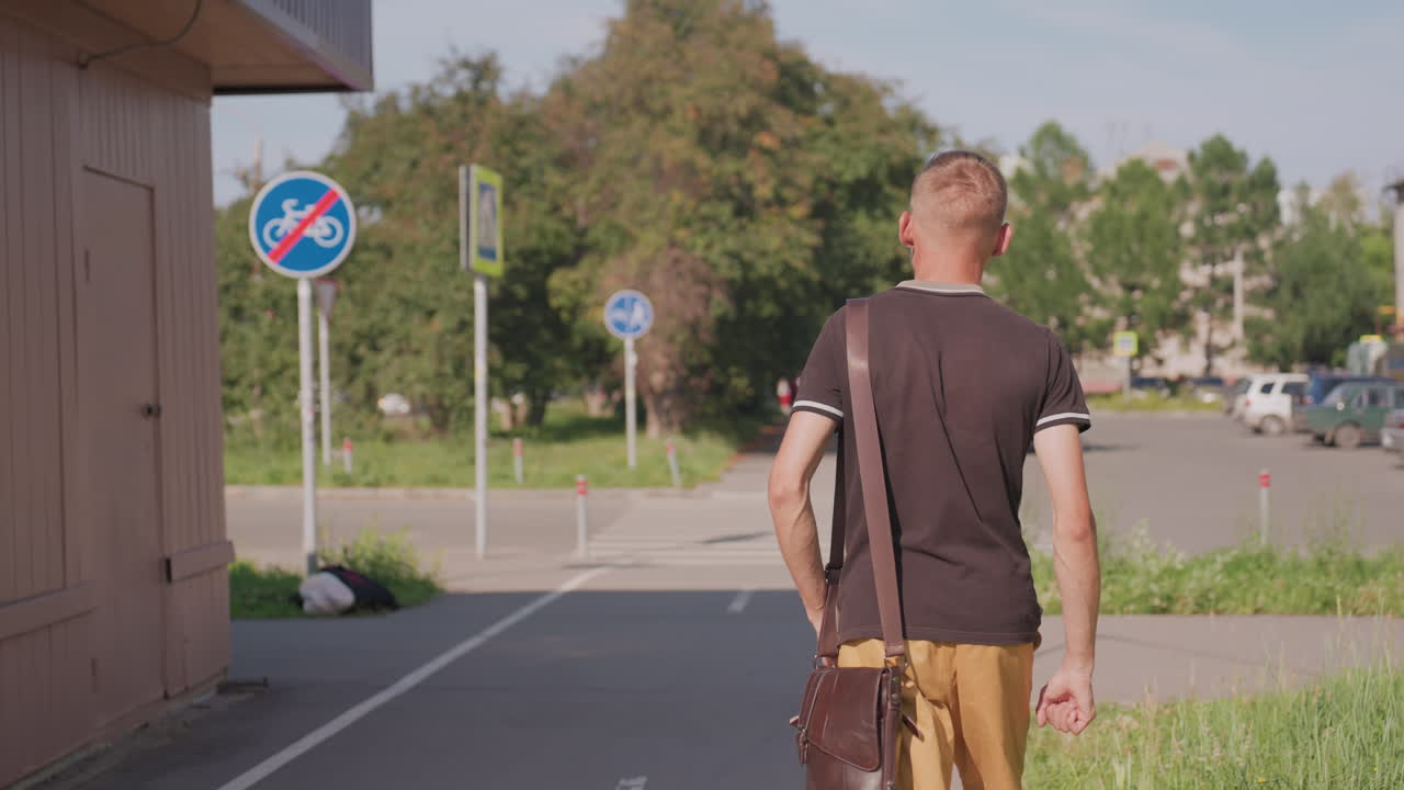 Man Hesitates Calmly, Silent Walker Watches Signals Carefully, Person Pauses Nervously Before Crossing Street, Individual Waits Attentively At Intersection For Traffic Signals To Change