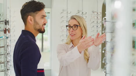 Female-optician-or-optometrist-helping-a-customer