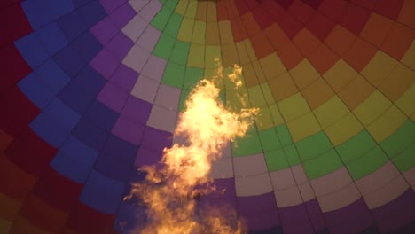 slomo clip of the fire inside a hot air balloon as the camera is moving slowly