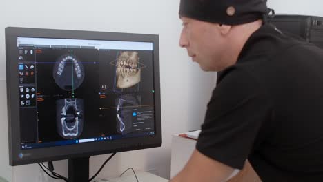 dentist reviewing dental x-rays