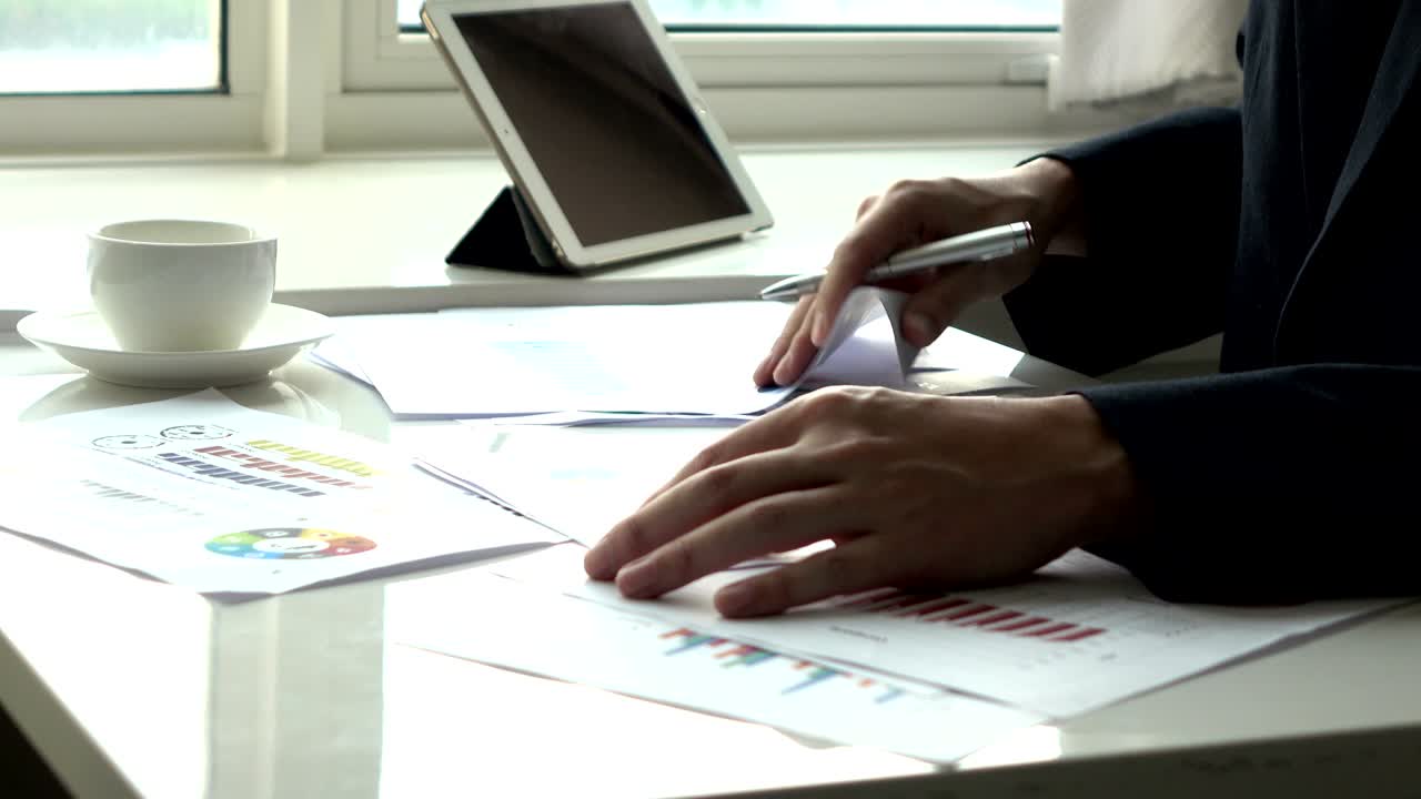 Man working with paperwork in the office