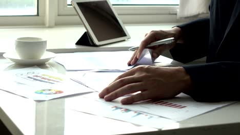 man working with paperwork in the office