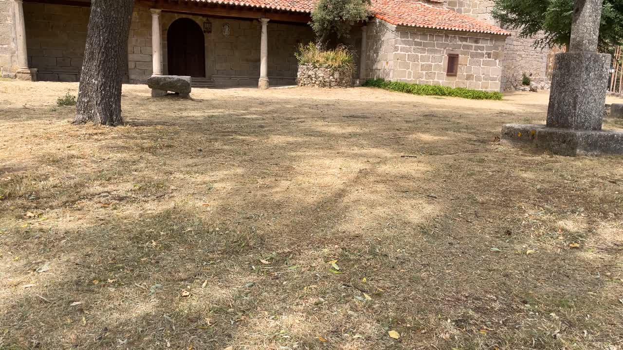 Ancient Stone Church in Sunny Setting