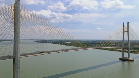 Few-Vehicles-Passing-By-The-Tsubasa-Bridge-Across-Mekong-River-During-Pandemic-In-Kandal-Province,-Cambodia