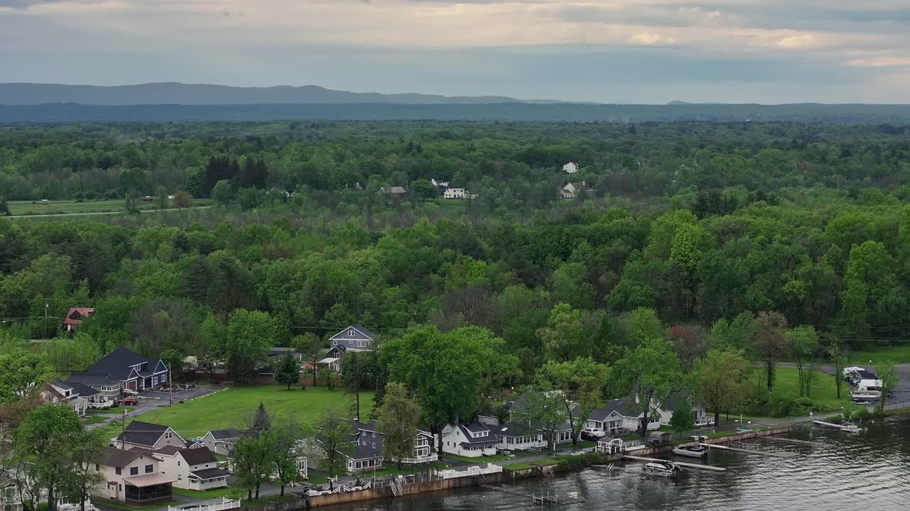Drone pan view of homes along Saratoga Lake