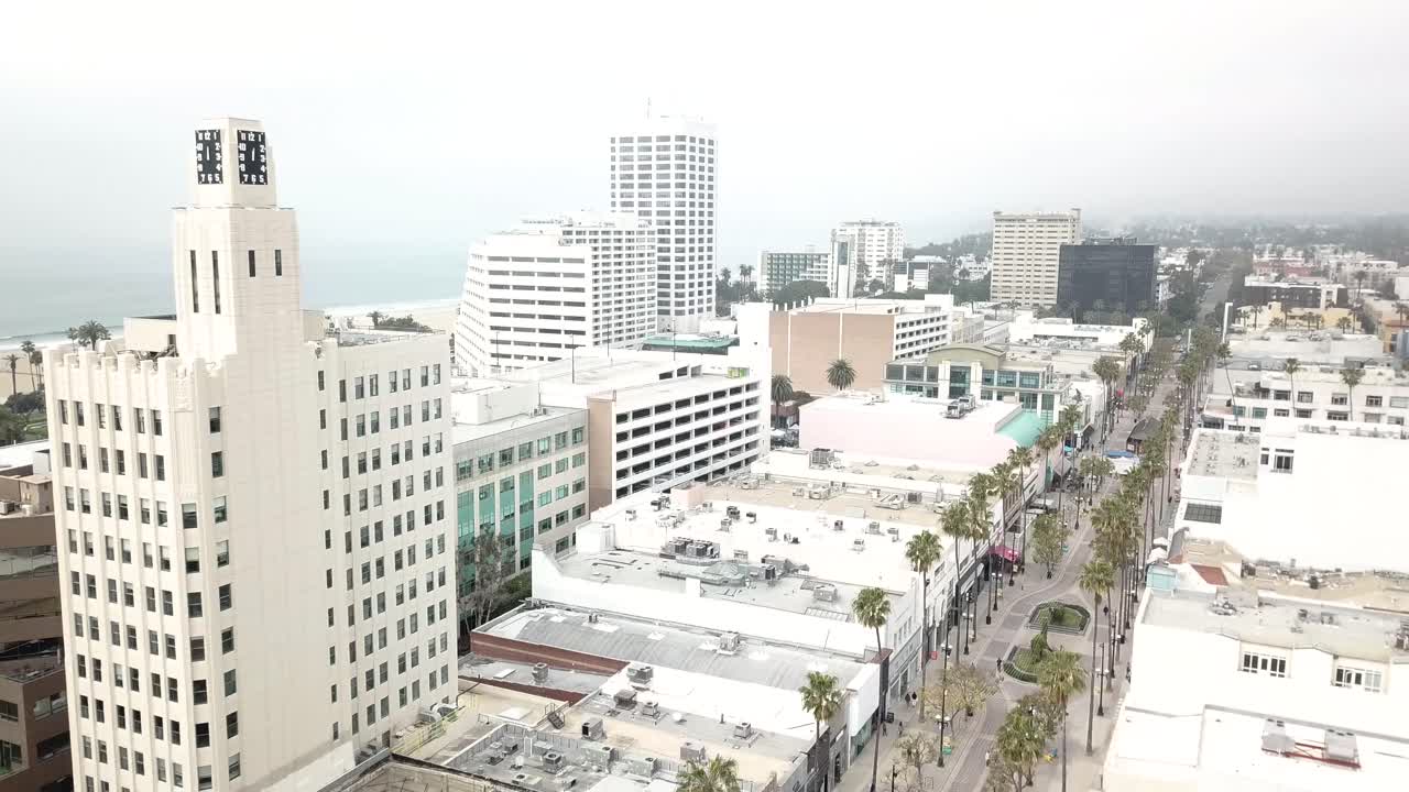 4K Panning Aerial Drone shot of Santa Monica, California with the Pacific Ocean and Pier in the Background on a Cloudy day
