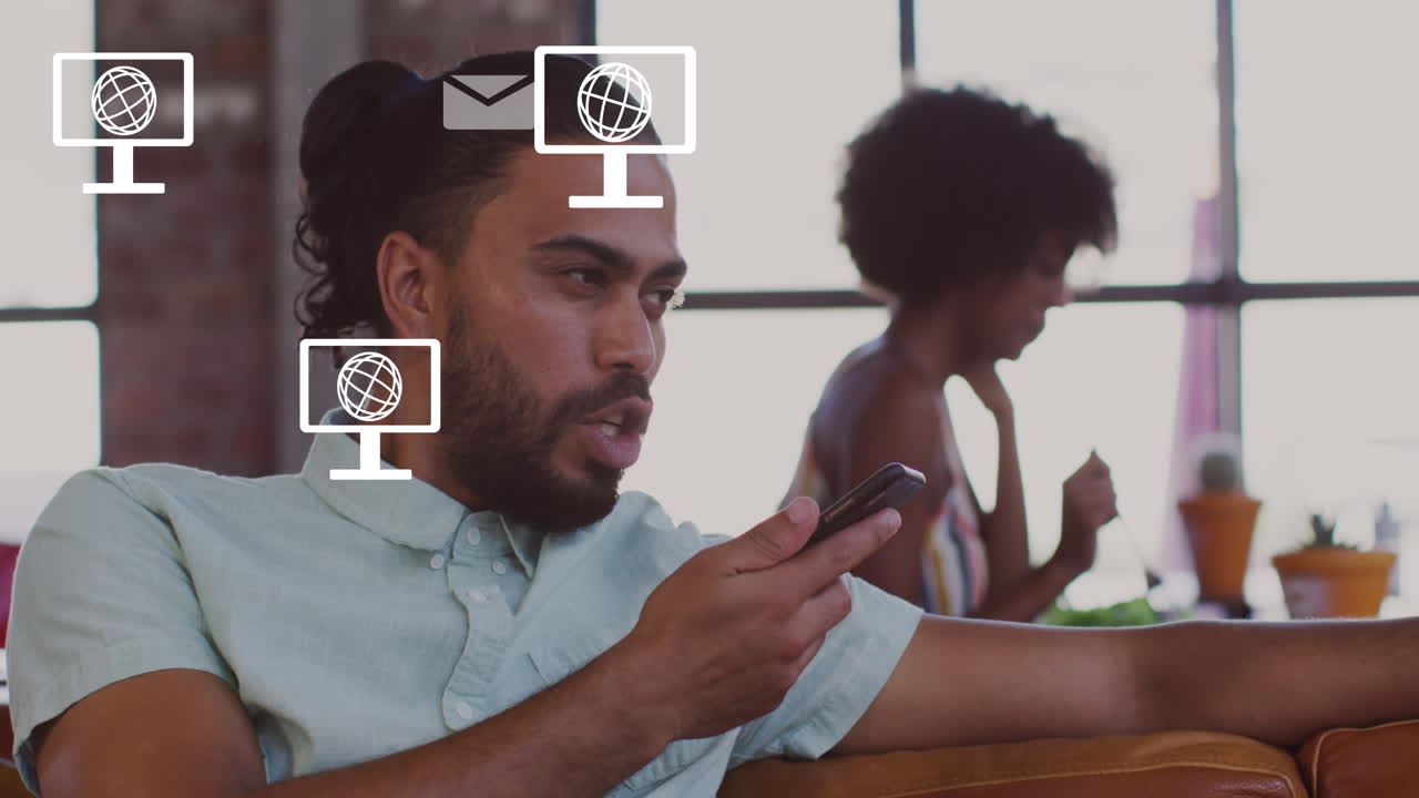 animación de iconos y procesamiento de datos sobre empresario biracial en la oficina.