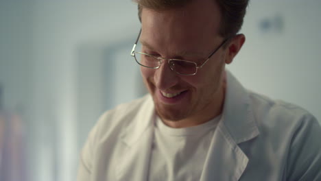 portrait smiling doctor consulting in hospital office. physician talking patient