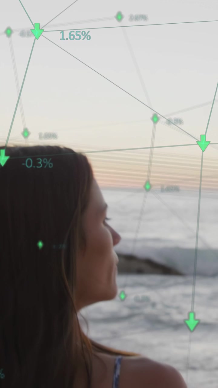 Vertical video: Woman standing shore, green data fading in from head, drifting to sea for tech