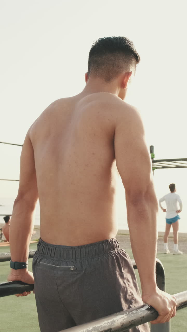 Man doing dips on a calisthenics bar