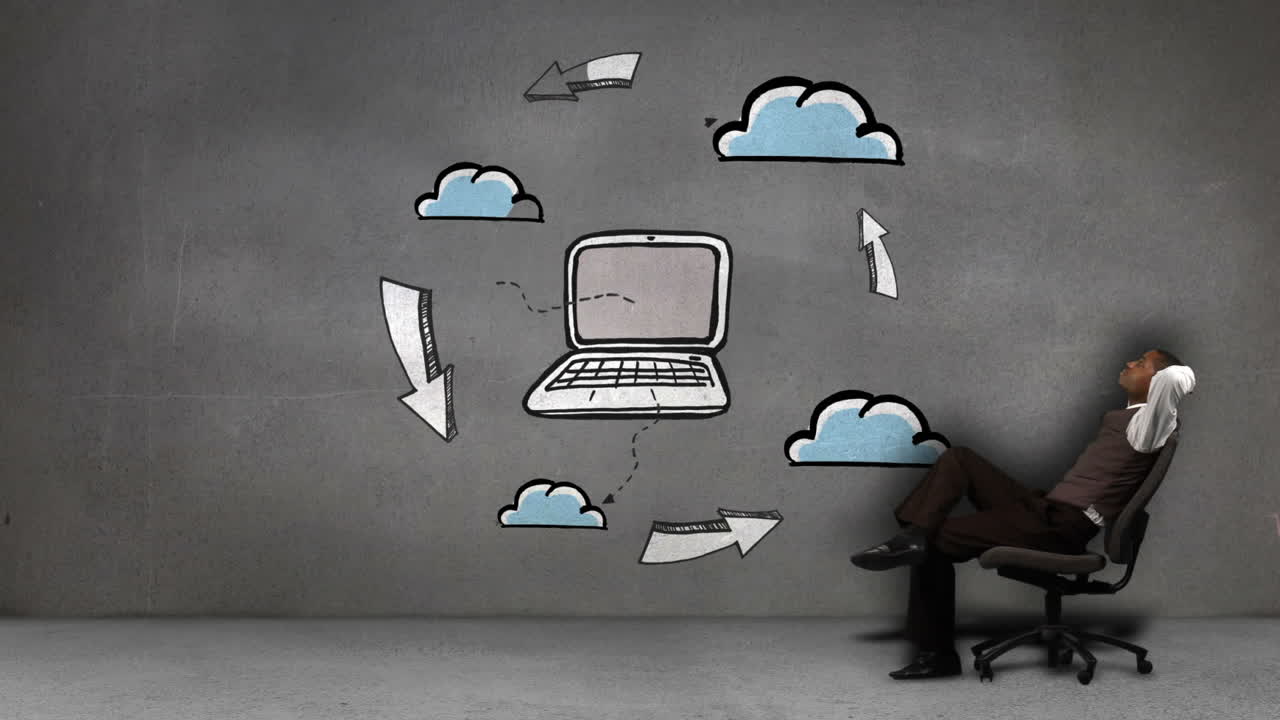 Businessman sitting in front of animated cloud computing