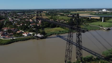 aerial static view of the rochefort sur mer transporter bridge, france