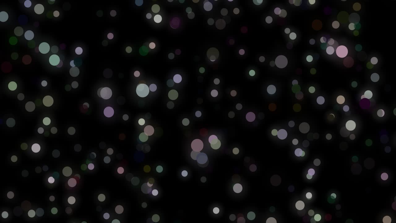 Blurred bokeh circles flying. Abstract shimmering circles. Defocused effect. Blur bokeh background. Horizontal composition, 4k video quality