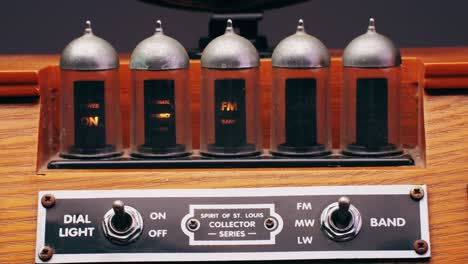 Old Retro AM FM Radio with tubes, Hand Changing stations , bulb vintage music player.