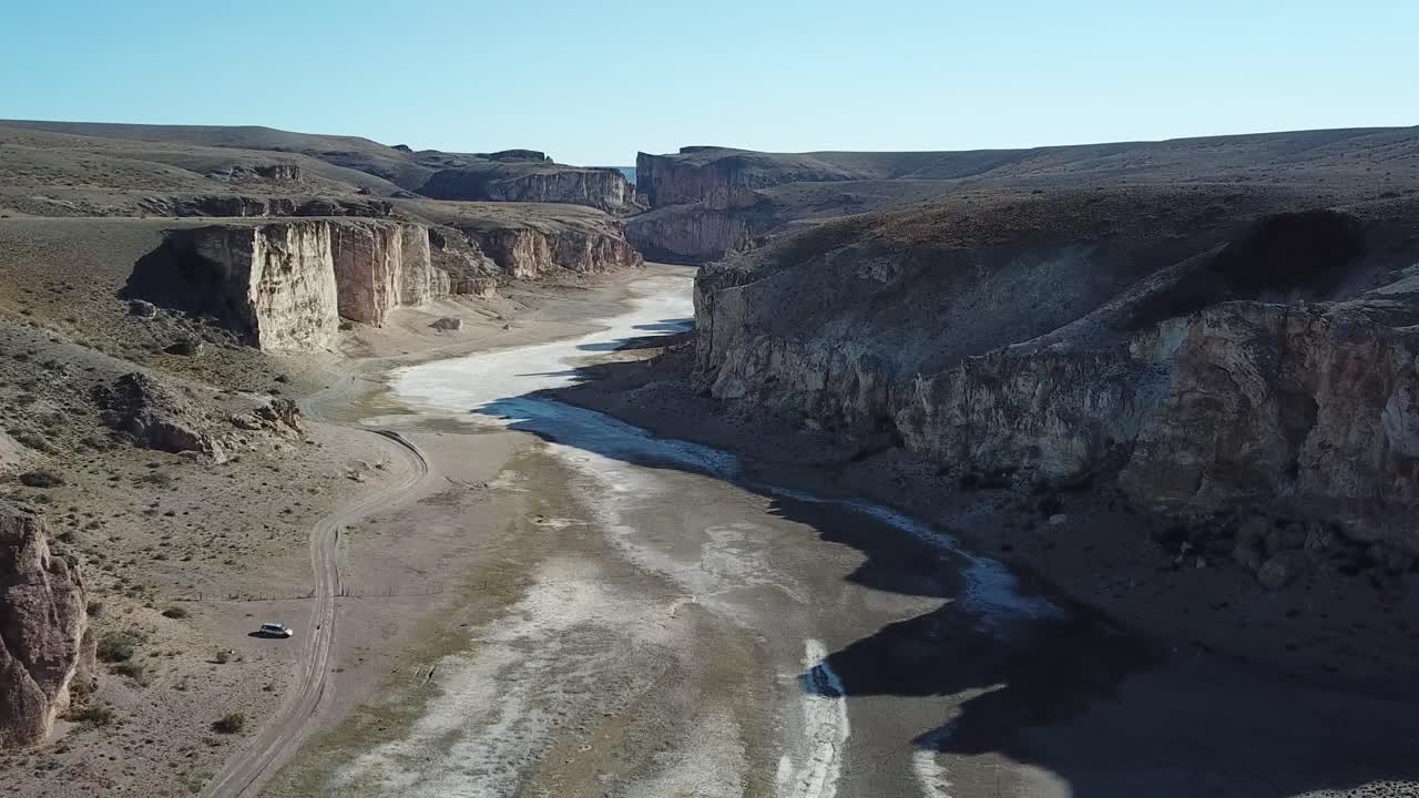Drone Aerial View of Dry Canyon With Salt Flat, Landscape of Patagonia, Argentina