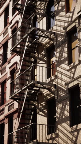 a fire escape on a brick building in a city