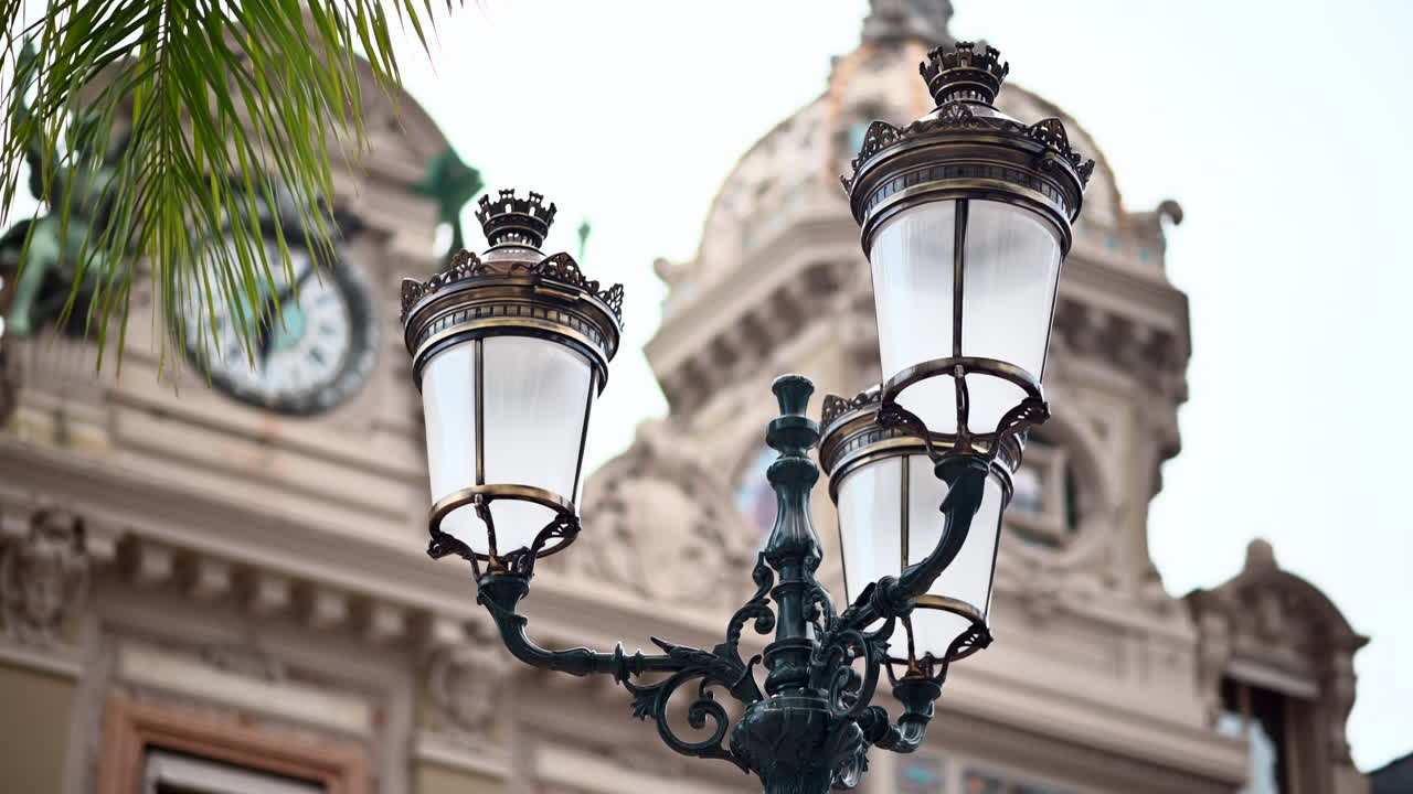 Casino of Monte Carlo building with big metallic lanterns in Monaco, close up view