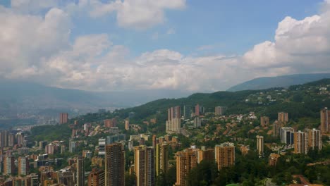 flying over el poblado neighborhood in medellin, colombia