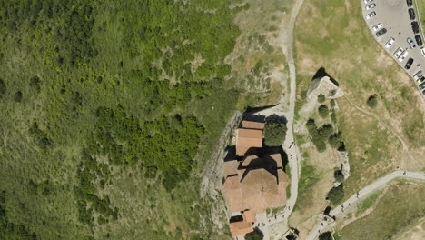 overhead view of jvari orthodox monastery in mountaintop near mtskheta, eastern georgia