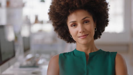 portrait-mixed-race-business-woman-with-afro-looking-confident-entrepreneur-enjoying-successful-startup-company-proud-manager-in-office-workspace