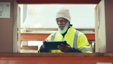 Industry,-tablet-and-mature-man-in-warehouse