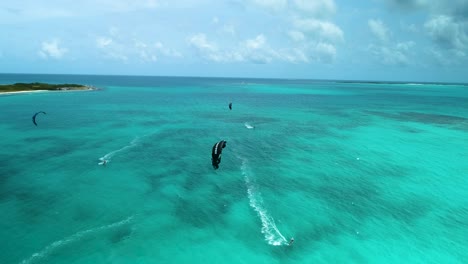 kite surfers enjoying vacation at cayo de agua island in the caribbean sea