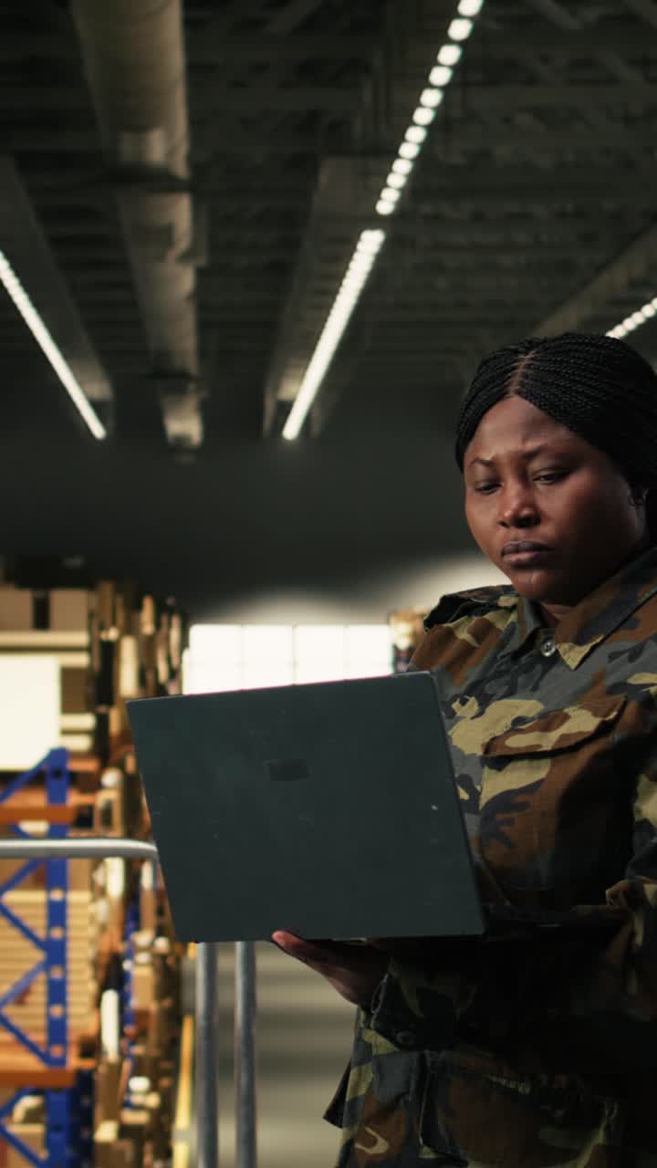 Vertical Video Female military personnel overseeing mission logistics for e-commerce operations