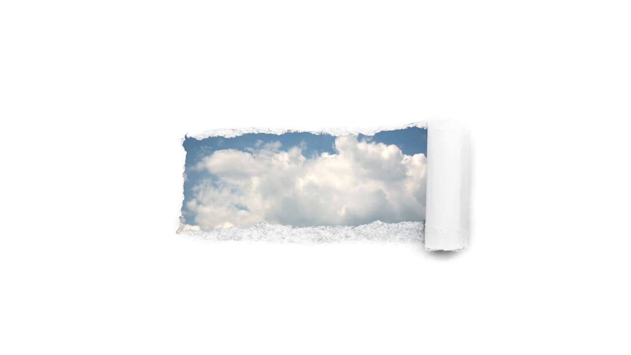 Creative 4k time laps video of fast moving clouds in the blue sky that are visible through a hole with torn edges in white paper. The concept of opportunities, a happy future.