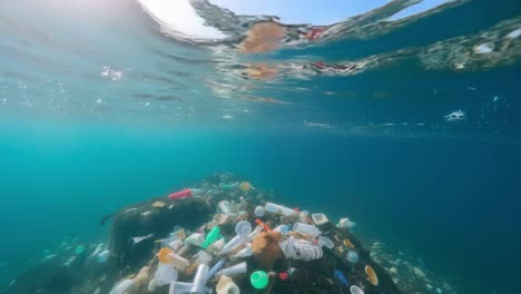 plastic and various types of garbage polluting ocean waters, highlighting the urgent environmental issue of plastic waste contaminating marine ecosystems and threatening sea life